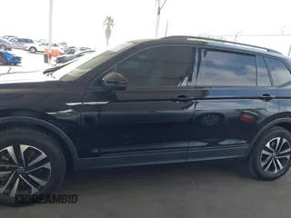 2023 Volkswagen Tiguan S with VIN 3VVRB7AX8PM068965, listed as a IAAI auction lot 42117545 with 60,121 mi miles and . Bid and sale history available at DreamBid. Image 14.