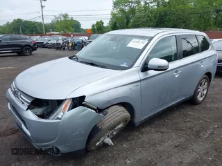 2014 Mitsubishi Outlander GT with VIN JA4JZ4AX3EZ013934, listed as a IAAI auction lot 42382774 with 66,829 mi miles and . Bid and sale history available at DreamBid. Image 6.