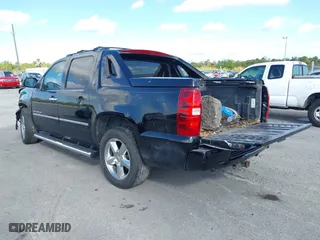 2013 Chevrolet Avalanche LTZ with VIN 3GNMCGE05DG351022, listed as a IAAI auction lot 41138090 with 197,159 mi miles. Bid and sale history available at carsss.com. Image 3.