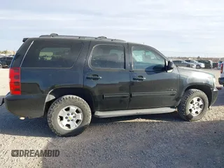 2013 Chevrolet Tahoe LS with VIN 1GNSCAE03DR193235, listed as a IAAI auction lot 41604766 with 204,455 mi miles and . Bid and sale history available at DreamBid. Image 13.
