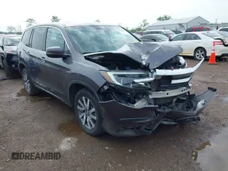 2019 Honda Pilot EX-L with VIN 5FNYF6H57KB053786, listed as a IAAI auction lot 42161832 with 89,326 mi miles and . Bid and sale history available at carsss.com. Image 1.