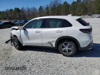 2025 Honda HR-V EX-L with VIN 3CZRZ1H73SM736834, listed as a Copart auction lot 49257865 with 3,477 mi miles and Salvage Title. Bid and sale history available at carsss.com. Image 2.