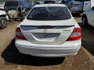 2009 Mercedes-Benz CLK-Class 3.5L with VIN WDBTJ56H09F261819, listed as a Copart auction lot 70021184 with 130,976 mi miles and Salvage Title. Bid and sale history available at carsss.com. Image 6.