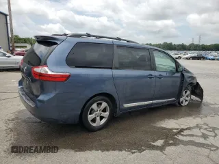 2015 Toyota Sienna LE AAS with VIN 5TDKK3DC5FS596673, listed as a Copart auction lot 61382965 with 176,447 mi miles and Salvage title. Bid and sale history available at DreamBid. Image 3.