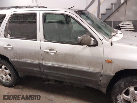2003 Mazda Tribute DX with VIN 4F2YZ02B73KM43813, listed as a IAAI auction lot 41575708 with 202,214 mi miles and . Bid and sale history available at carsss.com. Image 13.