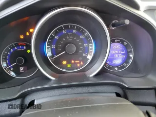 2015 Honda Fit EX-L с VIN 3HGGK5H80FM753745, выставлен на аукционе Copart как лот 60850515 с пробегом 69 414 миль миль и Списание • Salvage title. История ставок и продаж доступна на DreamBid. Изображение 9.