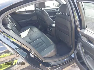 2019 BMW 5 Series M550i xDrive with VIN WBAJB9C51KB289355, listed as a IAAI auction lot 41867984 with 30,106 mi miles and . Bid and sale history available at DreamBid. Image 8.