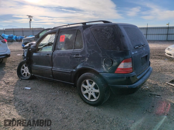 1999 Mercedes-Benz M 320/430/500 with VIN 4JGAB72E4XA096215, listed as a Copart auction lot 88049355 with Not provided miles and Salvage title. Bid and sale history available at DreamBid. Image 2.
