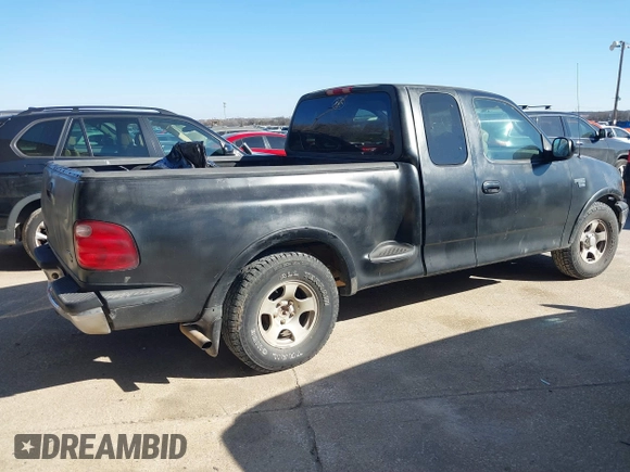 2001 Ford F-150 XL with VIN 2FTRX07W61CA71131, listed as a IAAI auction lot 41375828 with 216,340 mi miles. Bid and sale history available at carsss.com. Image 4.