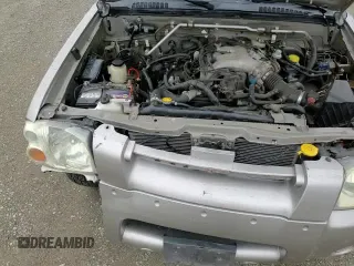 2004 Nissan Frontier XE with VIN 1N6ED29Y34C474296, listed as a Copart auction lot 87038494 with 195,260 mi miles and Salvage title. Bid and sale history available at DreamBid. Image 13.