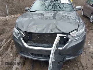 2015 Ford Taurus Limited with VIN 1FAHP2J88FG153326, listed as a IAAI auction lot 41465344 with 98,727 mi miles. Bid and sale history available at carsss.com. Image 6.