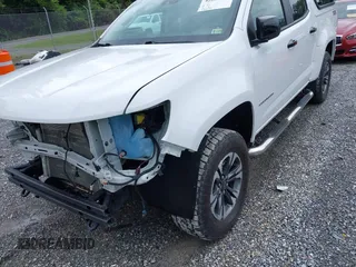 2021 Chevrolet Colorado 4WD Z71 with VIN 1GCGTDEN3M1122062, listed as a IAAI auction lot 42687632 with 52,233 mi miles and . Bid and sale history available at DreamBid. Image 17.