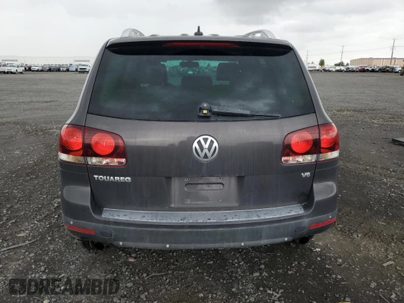 2008 Volkswagen Touareg V6 z VIN WVGBE77LX8D000610, wystawiony jako Copart lot #58434065 z przebiegiem 208 718 mil mil oraz Czysty tytuł • Clean title. Historia ofert i sprzedaży dostępna na DreamBid. Obrazek 6.