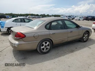 2004 Ford Taurus SE z VIN 1FAFP53U44A122559, wystawiony jako Copart lot #55606595 z przebiegiem Nie podano mil oraz Szkoda całkowita • Salvage title. Historia ofert i sprzedaży dostępna na DreamBid. Obrazek 3.