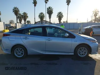 2021 Toyota Prius LE with VIN JTDKAMFP1M3196066, listed as a IAAI auction lot 41752179 with 90,200 mi miles and . Bid and sale history available at DreamBid. Image 14.