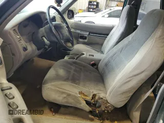 1998 Ford Explorer Sport with VIN 1FMYU22X4WUB36948, listed as a Copart auction lot 76699374 with 266,977 mi miles and Salvage title. Bid and sale history available at DreamBid. Image 7.