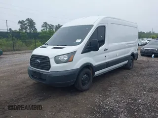 2016 Ford Transit Cargo z VIN 1FTBW2CM3GKA02227, wystawiony jako IAAI lot #42299621 z przebiegiem 145 070 mil mil oraz . Historia ofert i sprzedaży dostępna na DreamBid. Obrazek 2.