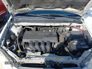 2004 Toyota Corolla CE with VIN JTDBR32E540051928, listed as a IAAI auction lot 41958483 with 299,999 mi miles. Bid and sale history available at carsss.com. Image 10.