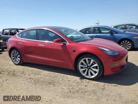 2018 Tesla Model 3 Long Range Battery z VIN 5YJ3E1EA4JF061733, wystawiony jako Copart lot #54885335 z przebiegiem 84 700 mil mil oraz Szkoda całkowita • Salvage title. Historia ofert i sprzedaży dostępna na DreamBid. Obrazek 4.
