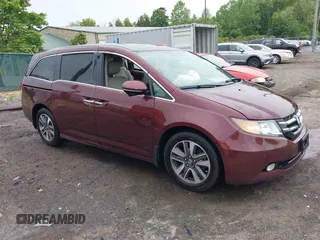2016 Honda Odyssey Touring Elite с VIN 5FNRL5H97GB044930, выставлен на аукционе IAAI как лот 42235443 с пробегом Не указан миль и . История ставок и продаж доступна на DreamBid. Изображение 1.