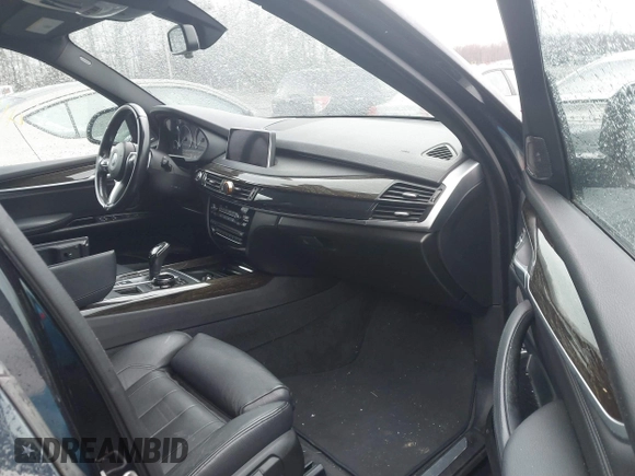 2014 BMW X5 xDrive50i with VIN 5UXKR6C59E0C03597, listed as a IAAI auction lot 41866944 with 65,890 mi miles. Bid and sale history available at carsss.com. Image 5.