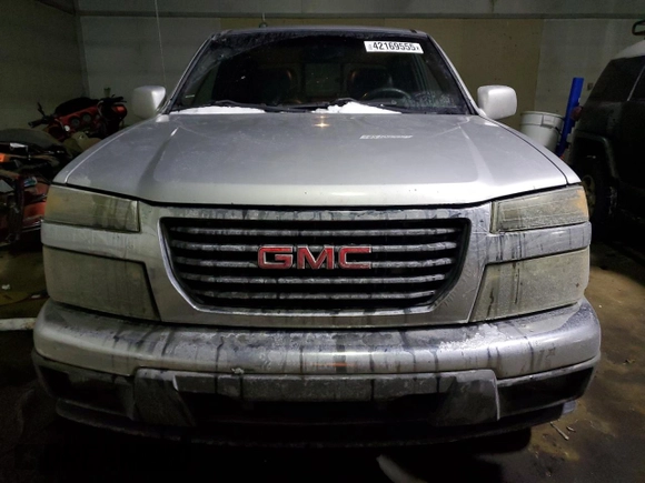 2010 GMC Canyon z VIN 1GTJTFDE0A8105967, wystawiony jako Copart lot #42169555 z przebiegiem 230 257 mil mil oraz Czysty tytuł • Clean title. Historia ofert i sprzedaży dostępna na DreamBid. Obrazek 5.