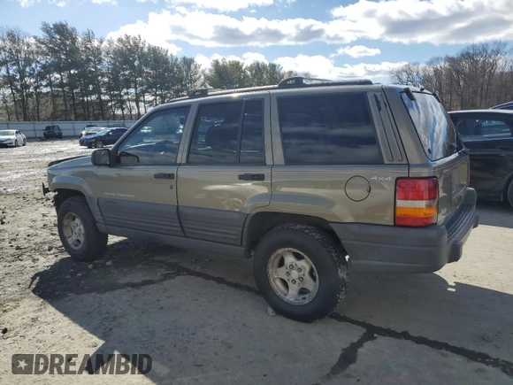 1997 Jeep Grand Cherokee Laredo with VIN 1J4GZ58SXVC569171, listed as a Copart auction lot 45657745 with 101,648 mi miles and Salvage Title. Bid and sale history available at carsss.com. Image 2.