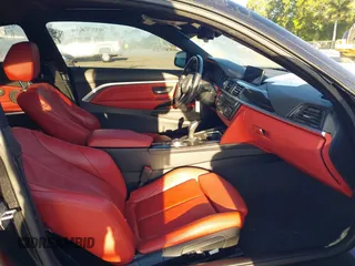 2016 BMW 4 Series 428i with VIN WBA3N7C53GK228813, listed as a IAAI auction lot 41832946 with 50,929 mi miles and . Bid and sale history available at carsss.com. Image 5.