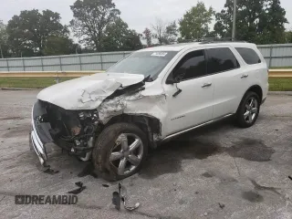 2011 Dodge Durango Citadel with VIN 1D4RD5GG4BC711295, listed as a Copart auction lot 71058884 with 208,639 mi miles and Salvage title. Bid and sale history available at DreamBid. Image 1.