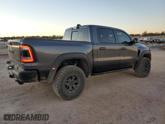 2022 Ram 1500 with VIN 0K0638713856, listed as a Copart auction lot 80997374 with 21,681 mi miles and Clean title. Bid and sale history available at DreamBid. Image 3.