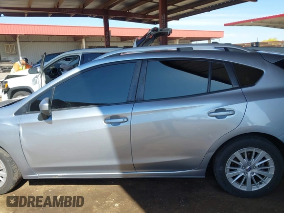 2017 Subaru Impreza Premium z VIN 4S3GTAB69H3703779, wystawiony jako IAAI lot #42151284 z przebiegiem 135 455 mil mil oraz . Historia ofert i sprzedaży dostępna na DreamBid. Obrazek 14.