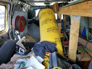 2005 Chevrolet Express Cargo z VIN 1GCFG15X751112877, wystawiony jako Copart lot #77494014 z przebiegiem 349 555 mil mil oraz Czysty tytuł • Clean title. Historia ofert i sprzedaży dostępna na DreamBid. Obrazek 10.