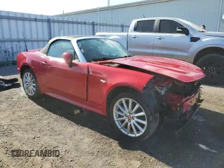 2017 FIAT 124 Spider Lusso z VIN JC1NFAEKXH0106484, wystawiony jako Copart lot #55729775 z przebiegiem 104 341 mil mil oraz Tytuł czysty. Historia ofert i sprzedaży dostępna na DreamBid. Obrazek 4.