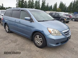 2006 Honda Odyssey EX with VIN 5FNRL38416B086145, listed as a IAAI auction lot 42626011 with 240,382 mi miles and . Bid and sale history available at DreamBid. Image 1.