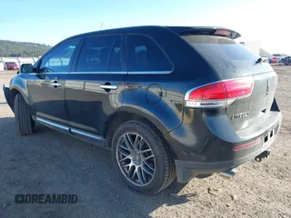 2011 Lincoln MKX with VIN 2LMDJ8JK2BBJ33518, listed as a IAAI auction lot 41827781 with 127,023 mi miles. Bid and sale history available at carsss.com. Image 3.