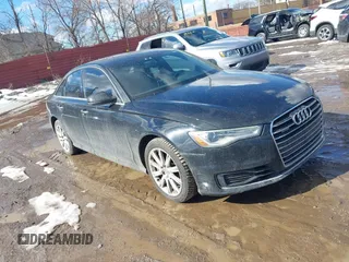 2016 Audi A6 Premium Plus z VIN WAUGFAFCXGN147215, wystawiony jako IAAI lot #41655394 z przebiegiem 143 357 mil mil oraz . Historia ofert i sprzedaży dostępna na DreamBid. Obrazek 1.
