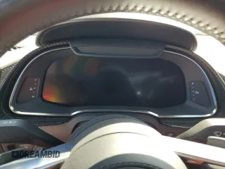 2018 Audi R8 z VIN WUAVACFX1J7900121, wystawiony jako Copart lot #75092964 z przebiegiem Nie podano mil oraz Szkody całkowita. Historia ofert i sprzedaży dostępna na DreamBid. Obrazek 9.