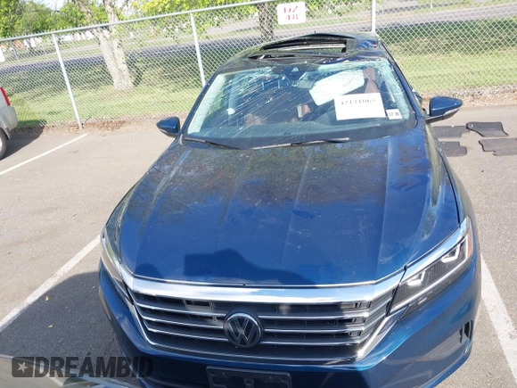 2021 Volkswagen Passat SE with VIN 1VWSA7A36MC010749, listed as a IAAI auction lot 42141065 with 43,571 mi miles and . Bid and sale history available at DreamBid. Image 12.