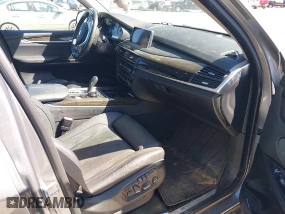 2016 BMW X5 xDrive40e z VIN 5UXKT0C50G0F75010, wystawiony jako IAAI lot #41732410 z przebiegiem 88 671 mil mil oraz . Historia ofert i sprzedaży dostępna na DreamBid. Obrazek 5.