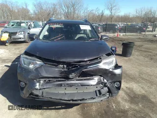 2018 Toyota RAV4 XLE with VIN JTMRFREV9JJ742276, listed as a IAAI auction lot 41855530 with 115,815 mi miles. Bid and sale history available at carsss.com. Image 12.