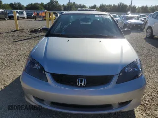 2005 Honda Civic LX with VIN 1HGEM21565L035293, listed as a Copart auction lot 74350794 with 197,536 mi miles and Salvage Title. Bid and sale history available at DreamBid. Image 5.