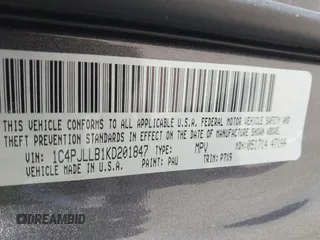 2019 Jeep Cherokee Latitude Plus with VIN 1C4PJLLB1KD201847, listed as a IAAI auction lot 41814463 with 115,927 mi miles. Bid and sale history available at carsss.com. Image 9.