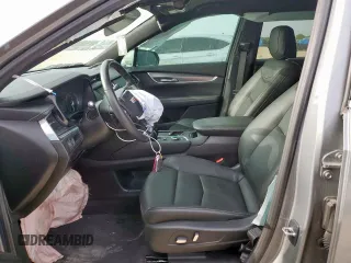 2024 Cadillac XT6 FWD Luxury with VIN 1GYKPAR41RZ700452, listed as a Copart auction lot 57675945 with 27,449 mi miles and Salvage title. Bid and sale history available at DreamBid. Image 7.