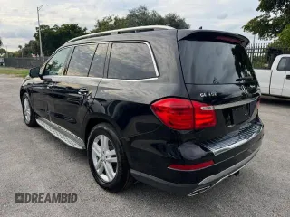 2016 Mercedes-Benz GL with VIN 4JGDF6EE1GA625384, listed as a Copart auction lot 77045634 with 104,938 mi miles and Salvage Title. Bid and sale history available at carsss.com. Image 2.