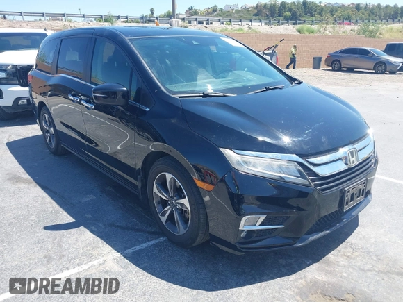 2018 Honda Odyssey Touring with VIN 5FNRL6H8XJB026247, listed as a IAAI auction lot 42298961 with 66,571 mi miles and . Bid and sale history available at DreamBid. Image 1.
