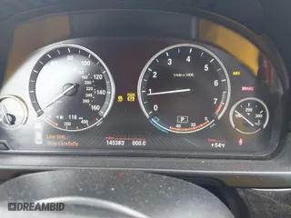 2014 BMW 5 Series 528i with VIN WBA5A5C5XED512448, listed as a IAAI auction lot 41559871 with 145,383 mi miles. Bid and sale history available at carsss.com. Image 7.