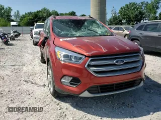 2019 Ford Escape Titanium z VIN 1FMCU9J90KUC24993, wystawiony jako Copart lot #61917895 z przebiegiem 57 101 mil mil oraz Czysty tytuł • Clean title. Historia ofert i sprzedaży dostępna na DreamBid. Obrazek 14.