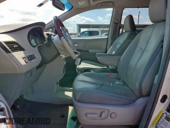 2014 Toyota Sienna XLE с VIN 5TDYK3DCXES480958, выставлен на аукционе Copart как лот 56367315 с пробегом 160 064 миль миль и Списание • Salvage title. История ставок и продаж доступна на DreamBid. Изображение 7.