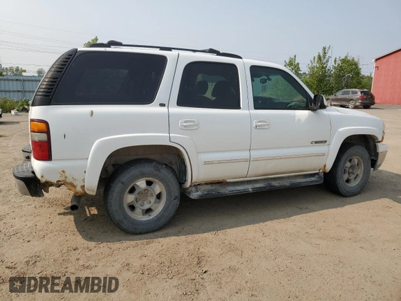2002 Chevrolet Tahoe LT z VIN 1GNEK13Z32J217370, wystawiony jako Copart lot #59101035 z przebiegiem 225 247 mil mil oraz Czysty tytuł • Clean title. Historia ofert i sprzedaży dostępna na DreamBid. Obrazek 3.