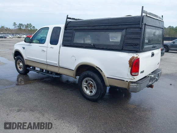 1999 Ford F-150 XL with VIN 1FTRX18LXXNA16159, listed as a IAAI auction lot 41746440 with 999,999 mi miles. Bid and sale history available at carsss.com. Image 3.